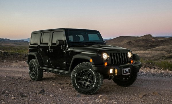 Quels sont les critères à considérer pour choisir des pneus tout-terrain pour une Jeep Wrangler?